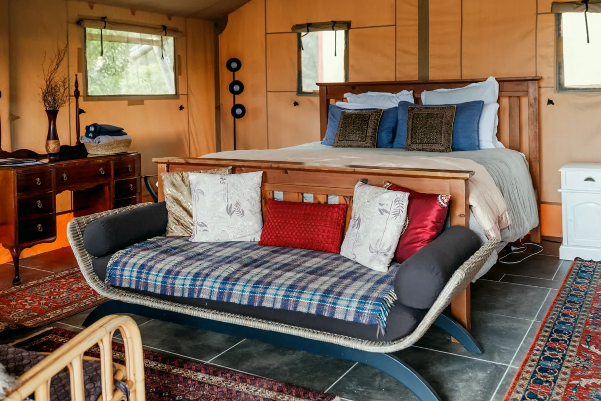 The bed and day bed inside the tent
